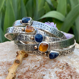 Deep blue Sapphire and golden Garnet and gold snakeskin cuffs