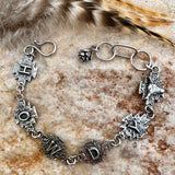 Howdy Cowgirl Aztec Sterling Silver hand carved bracelet