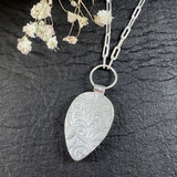 Kingman’s teardrop bronze & sterling silver necklace