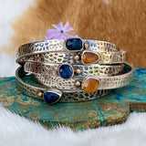 Deep blue Sapphire and golden Garnet and gold snakeskin cuffs