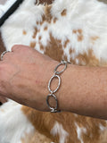 Oval hammered hand cast sterling silver bracelet