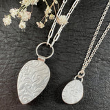 Kingman’s teardrop bronze & sterling silver necklace